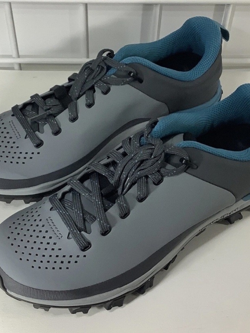Pearl Izlumi Womans Grey Athletic Sneakers with Blue Lining
